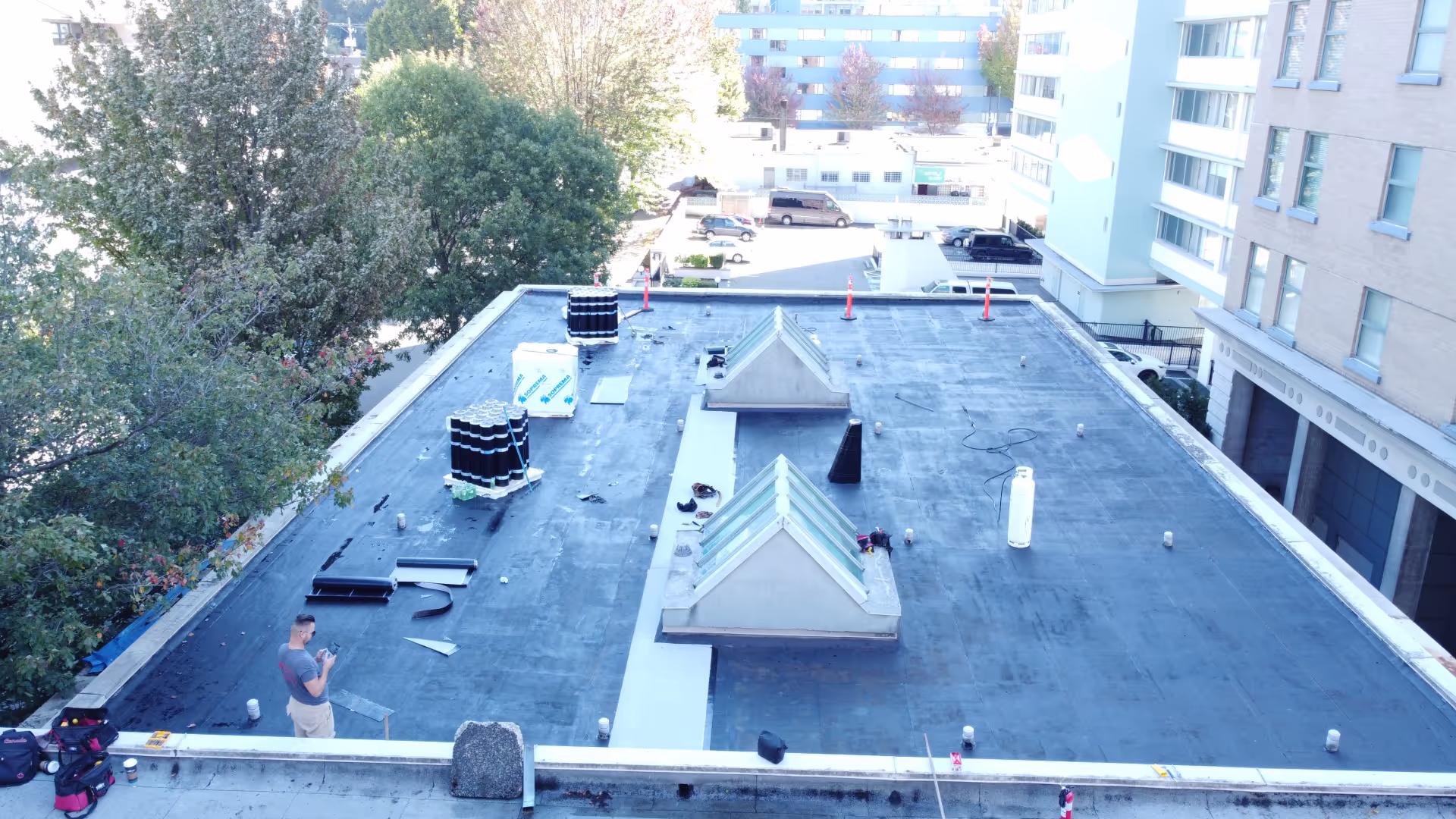 Sylvia Hotel, Vancouver — new torch-on roof with English Bay beyond