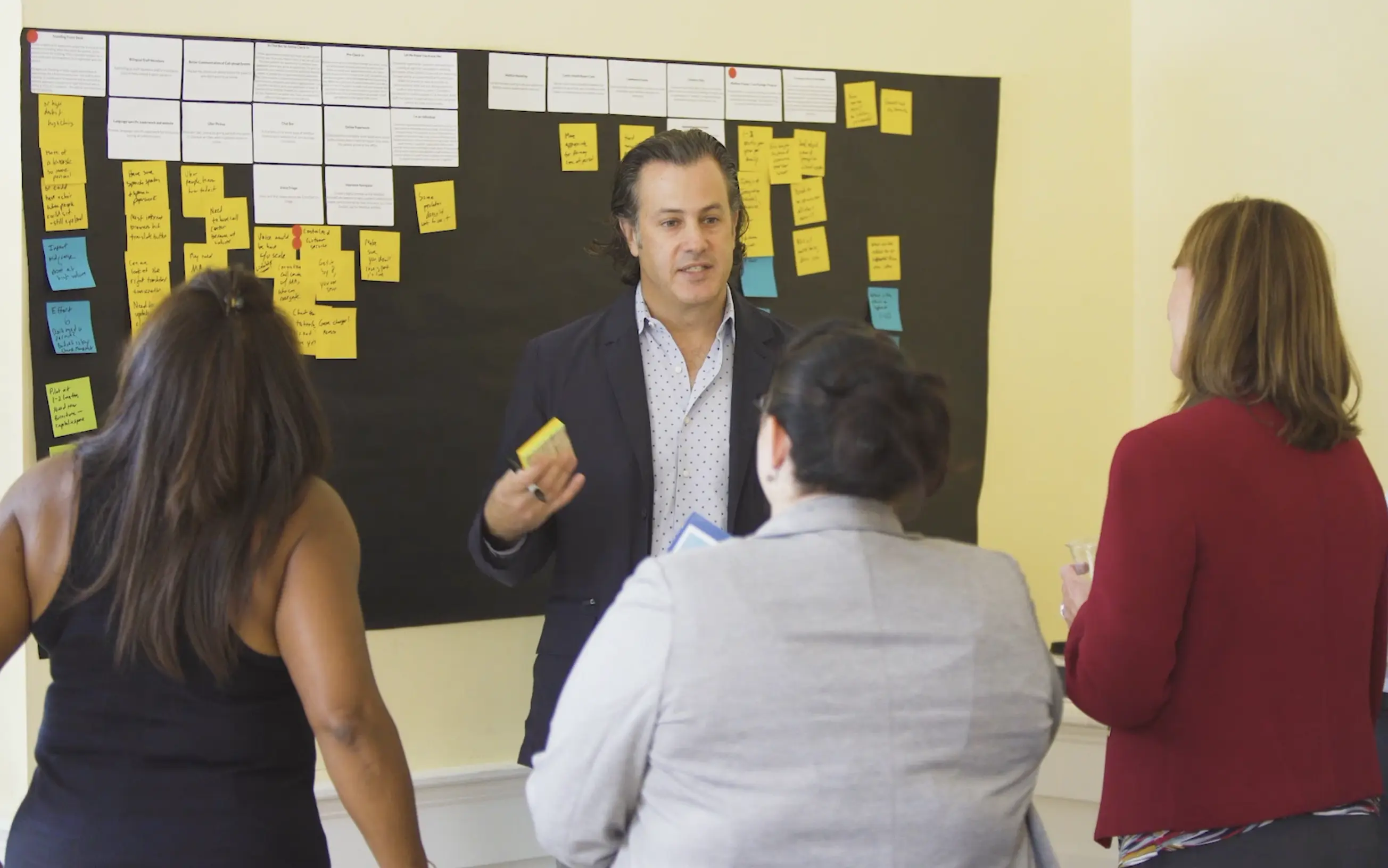 A human centered design consultant mapping the referral journey with providers