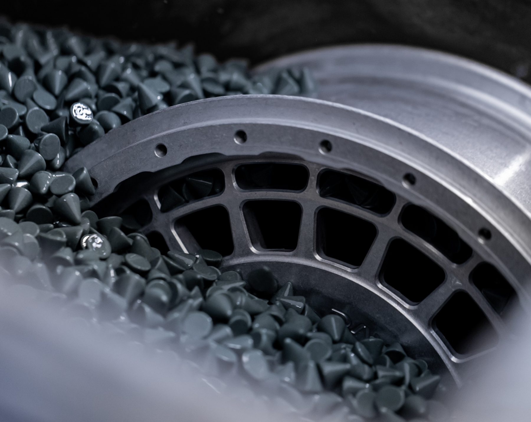 DAVY forged wheel with stone finish at manufacturing facility