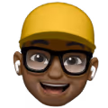 Smiling person with glasses wearing a yellow hard hat and white wireless earbuds.