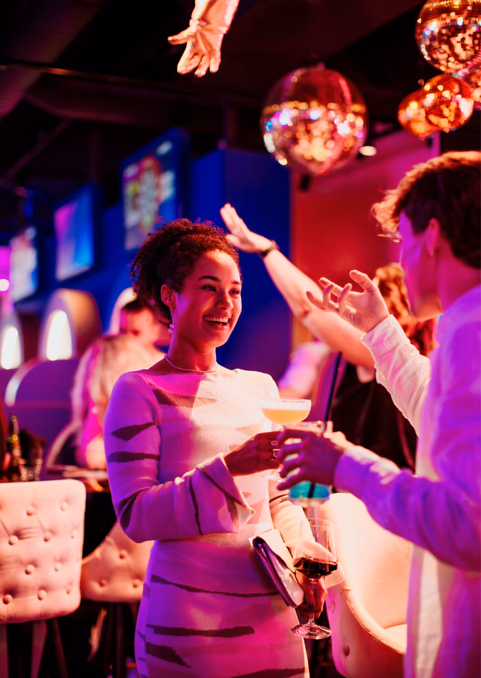 two people drinking a cocktail