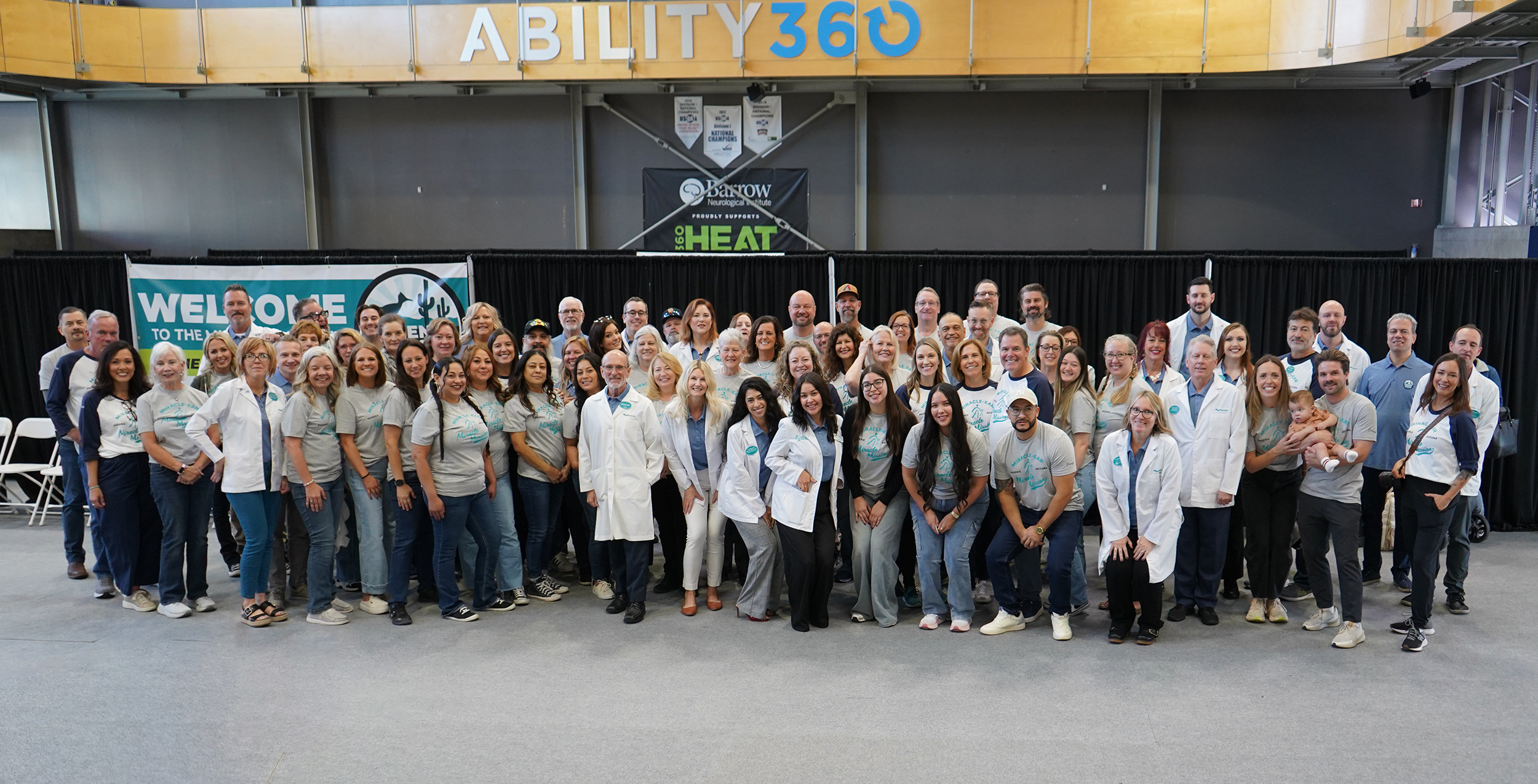Volunteers and staff gathered at the Ability360 venue during a Miracle Mission