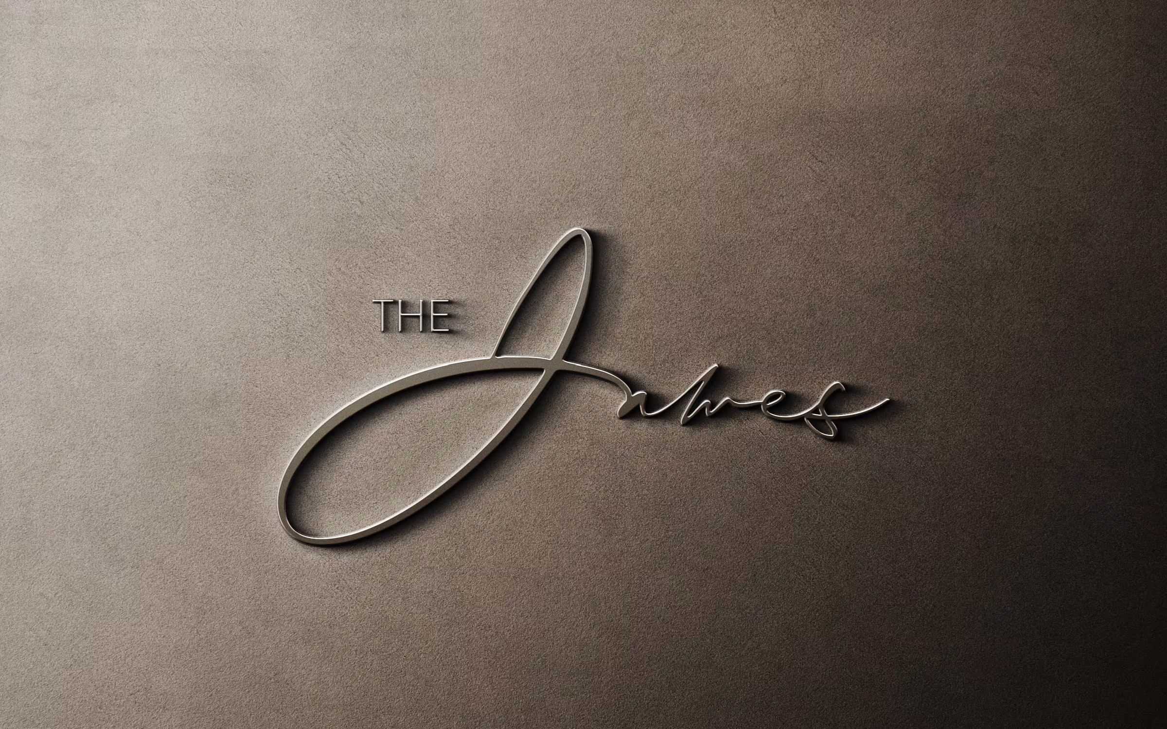The James signature logo as building signage
