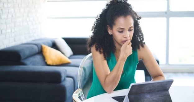 Woman looking at church finances on ipad