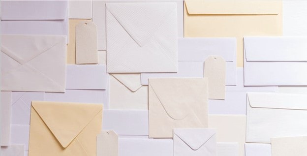 Letters in envelopes representing church emails
