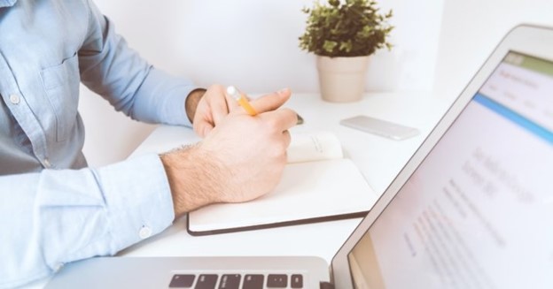Church admin working on capital campaign landing page