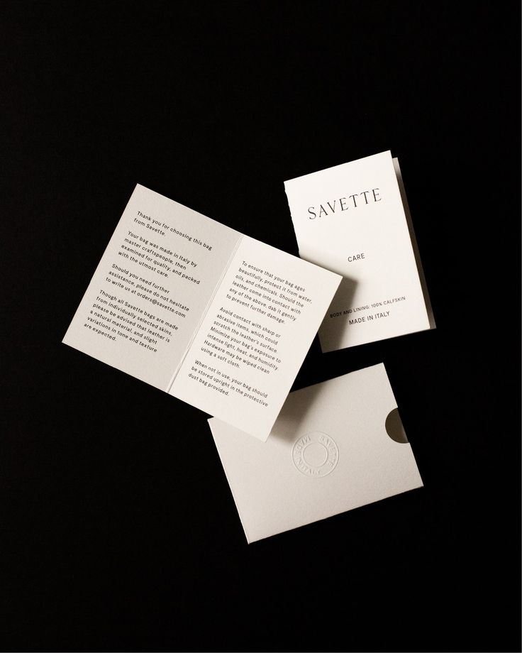 White care cards on a black background with product care instructions visible.