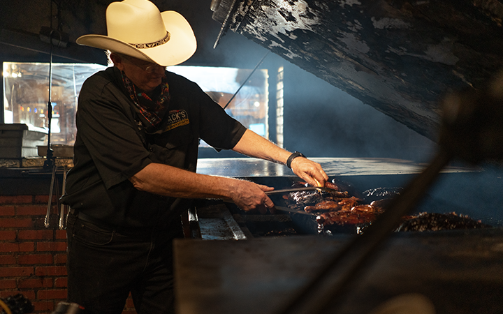 man grilling on a bbq