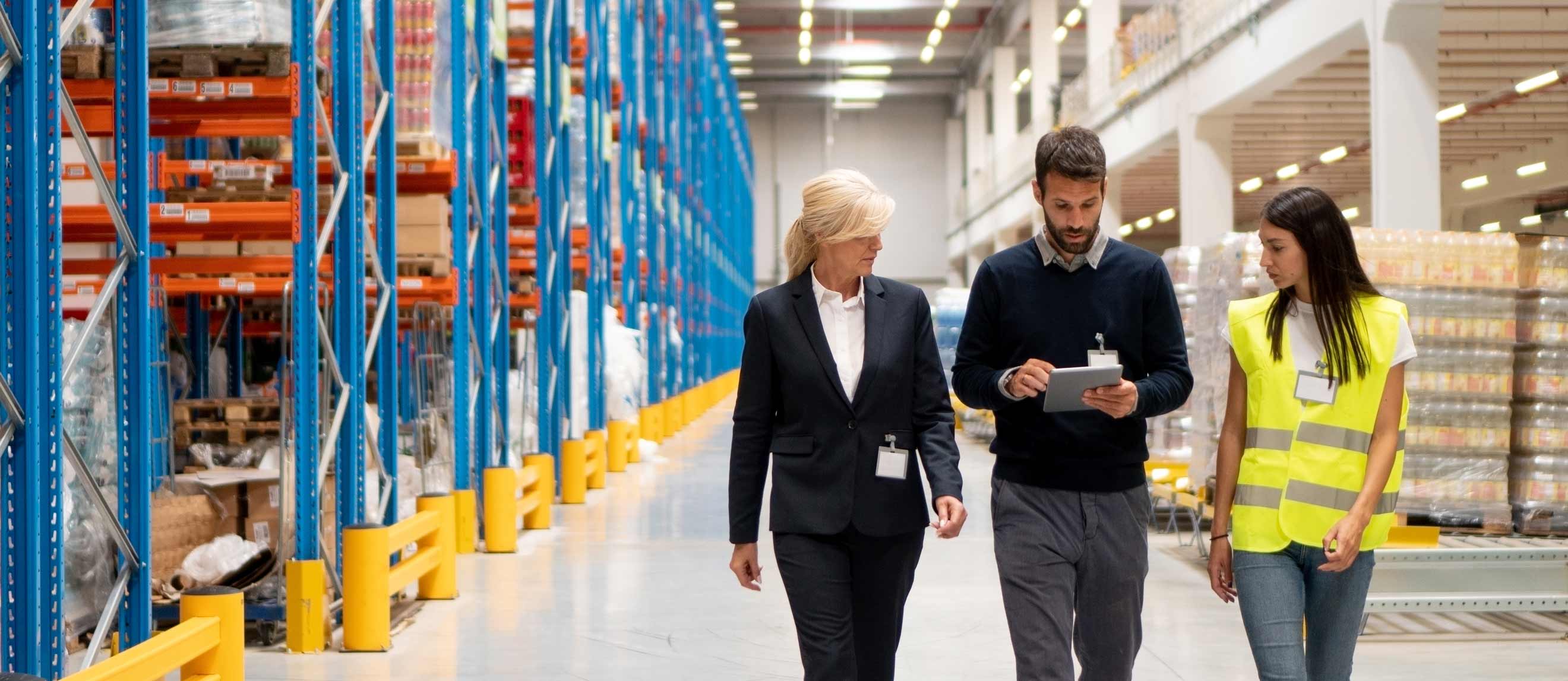 A smiling warehouse manager.