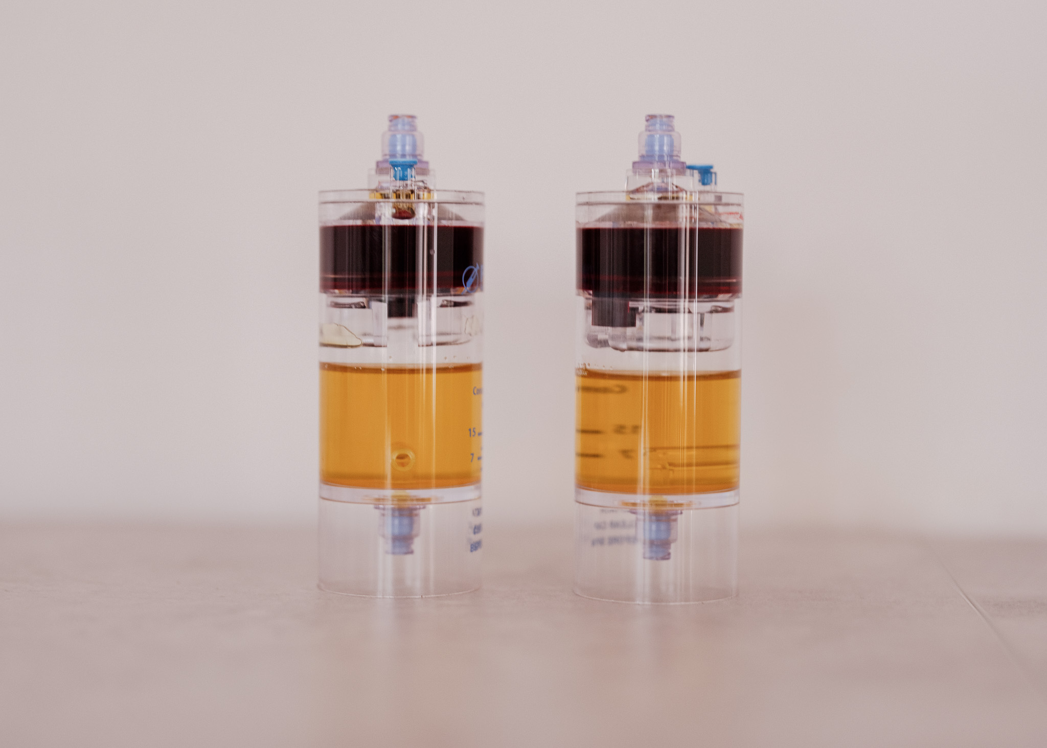 Two Pegasus PRP separation devices with blood components separated into layers