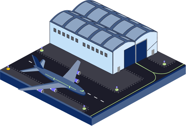 Commercial aircraft hangar and aviation facility viewed from above