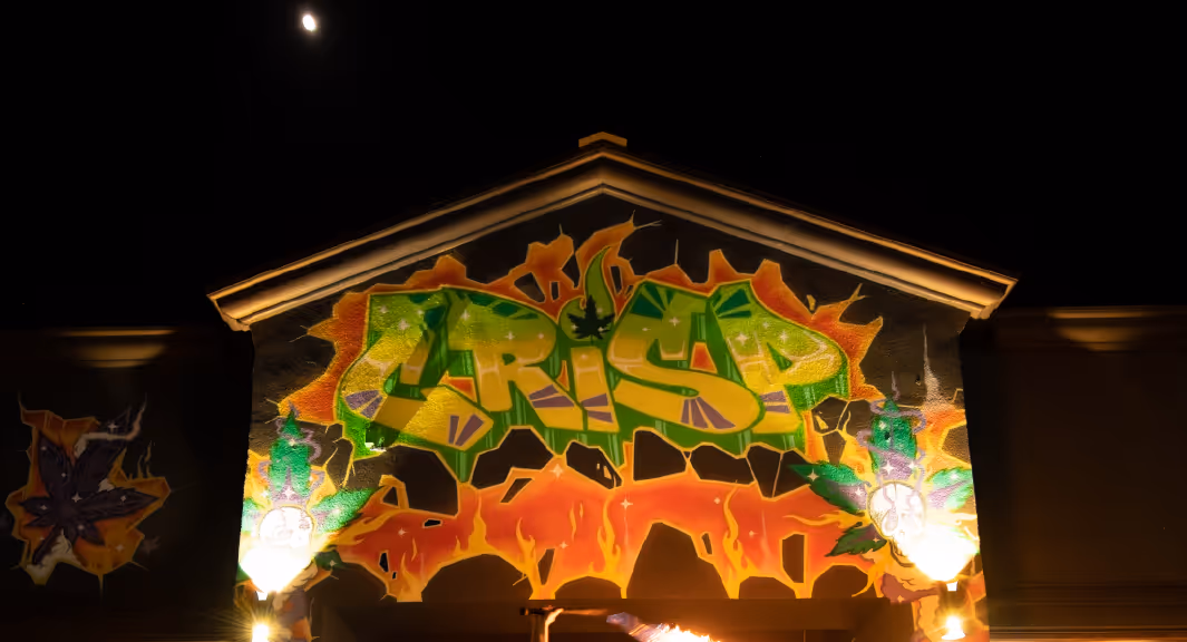 Front picture of crisp cannabis lounge and dispensary 