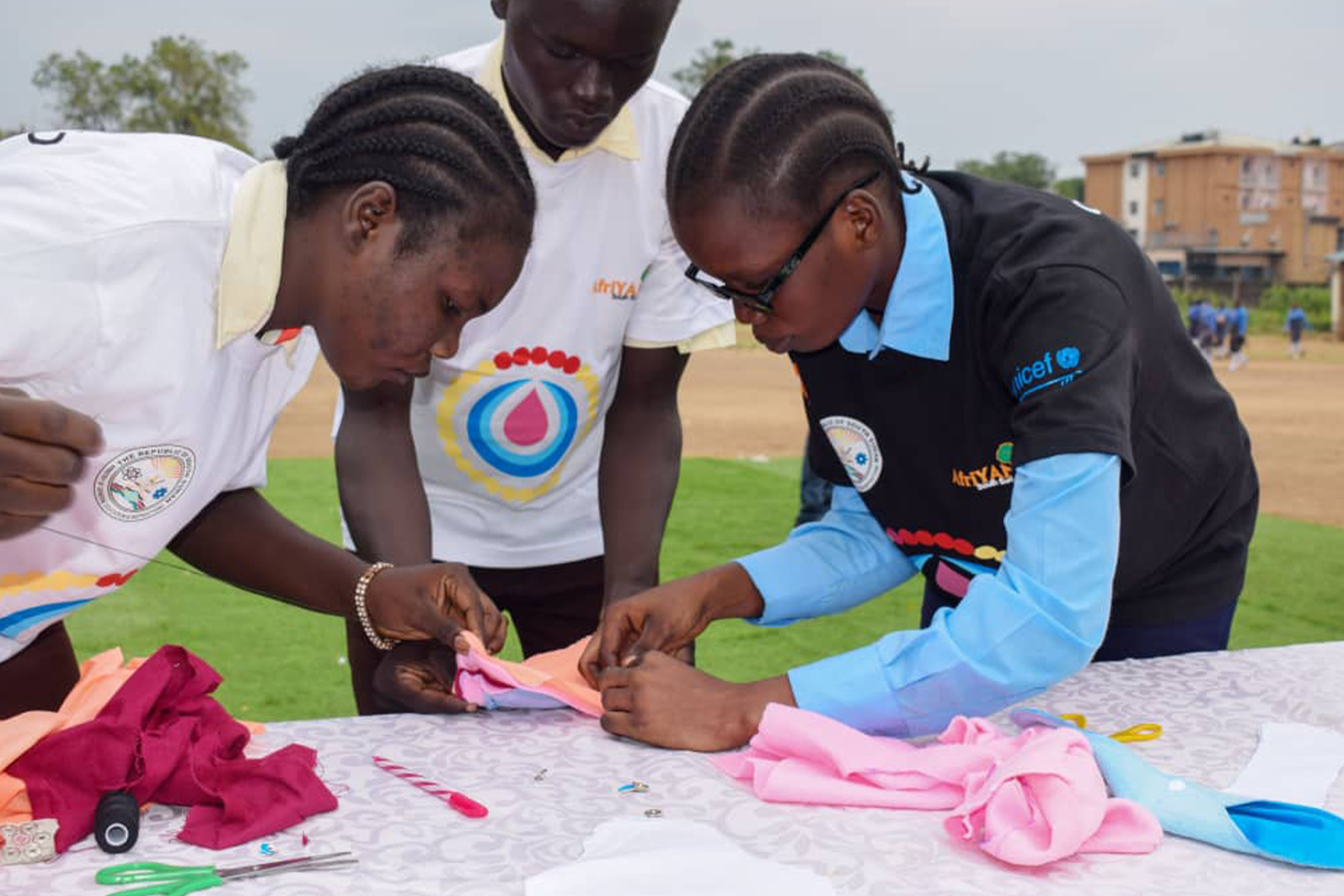 South Sudan: AfriYan youth leaders guided hands-on workshops on how to make reusable pads.
