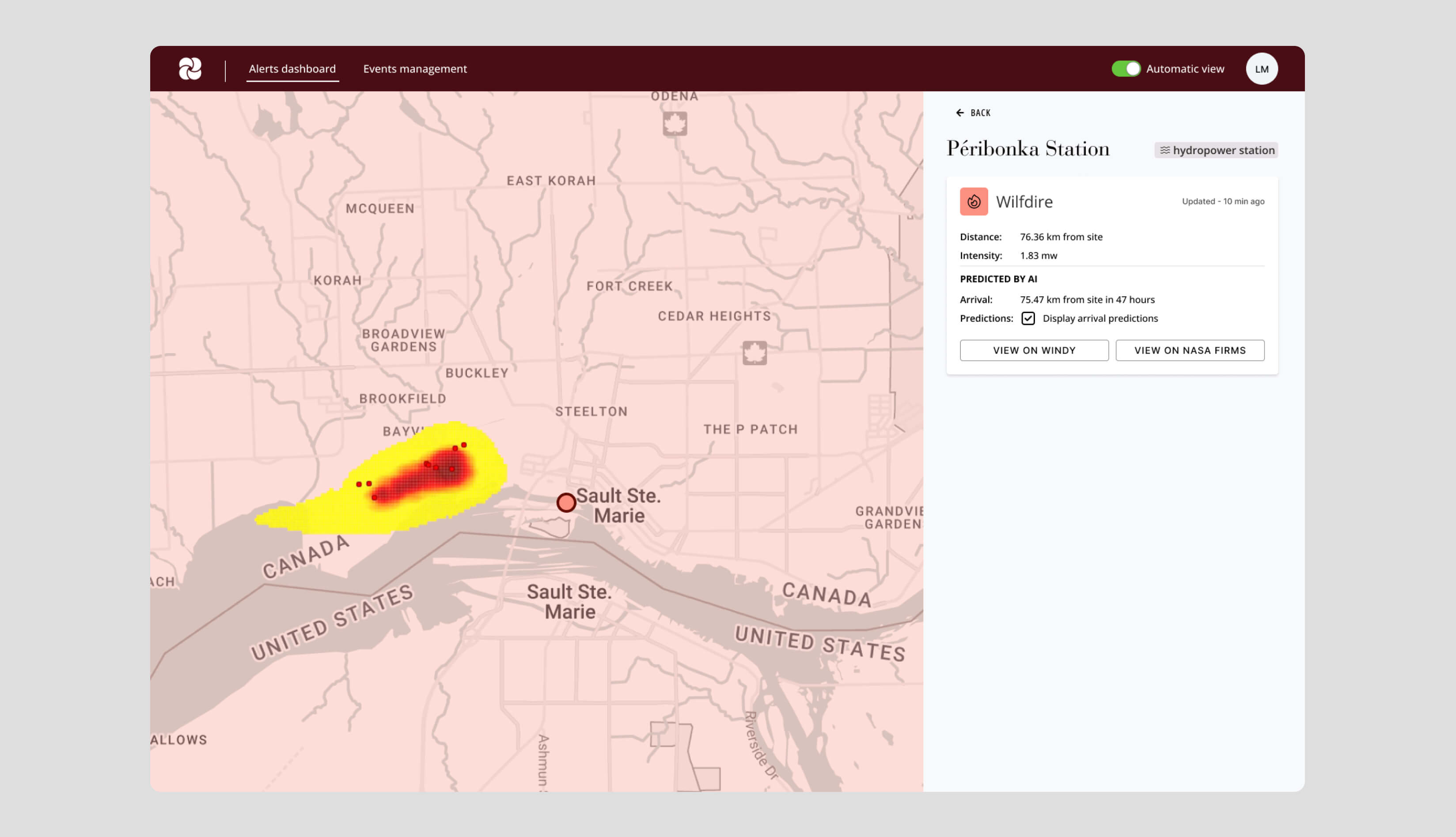Éoliennes sur un site d’énergie renouvelable entouré d’un paysage ouvert.