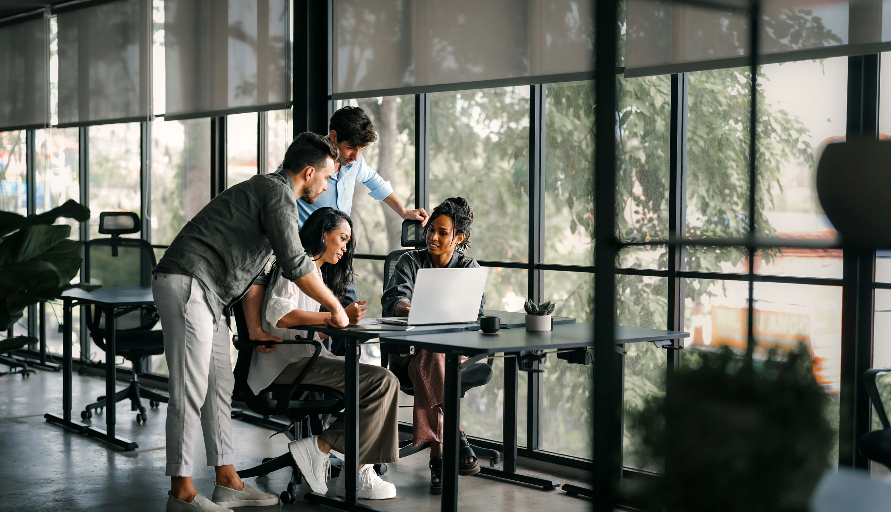 A movie production team working during a meeting