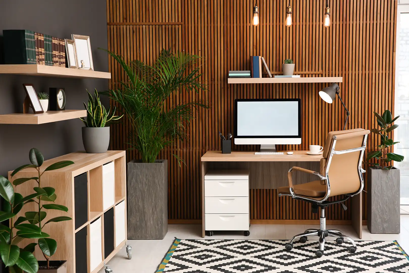 Callahan & Peters custom home office remodel with built-in storage, wood accent wall, and modern workspace design.