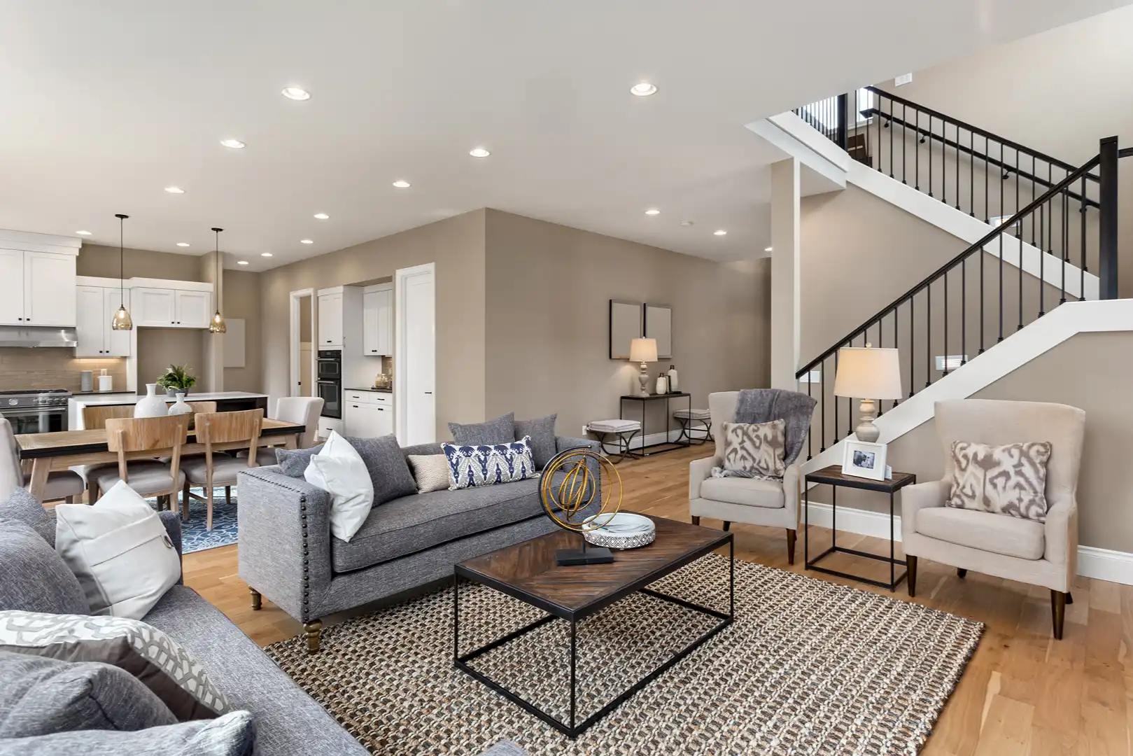 Callahan & Peters open-concept living room remodel with modern finishes, hardwood floors, and custom home design