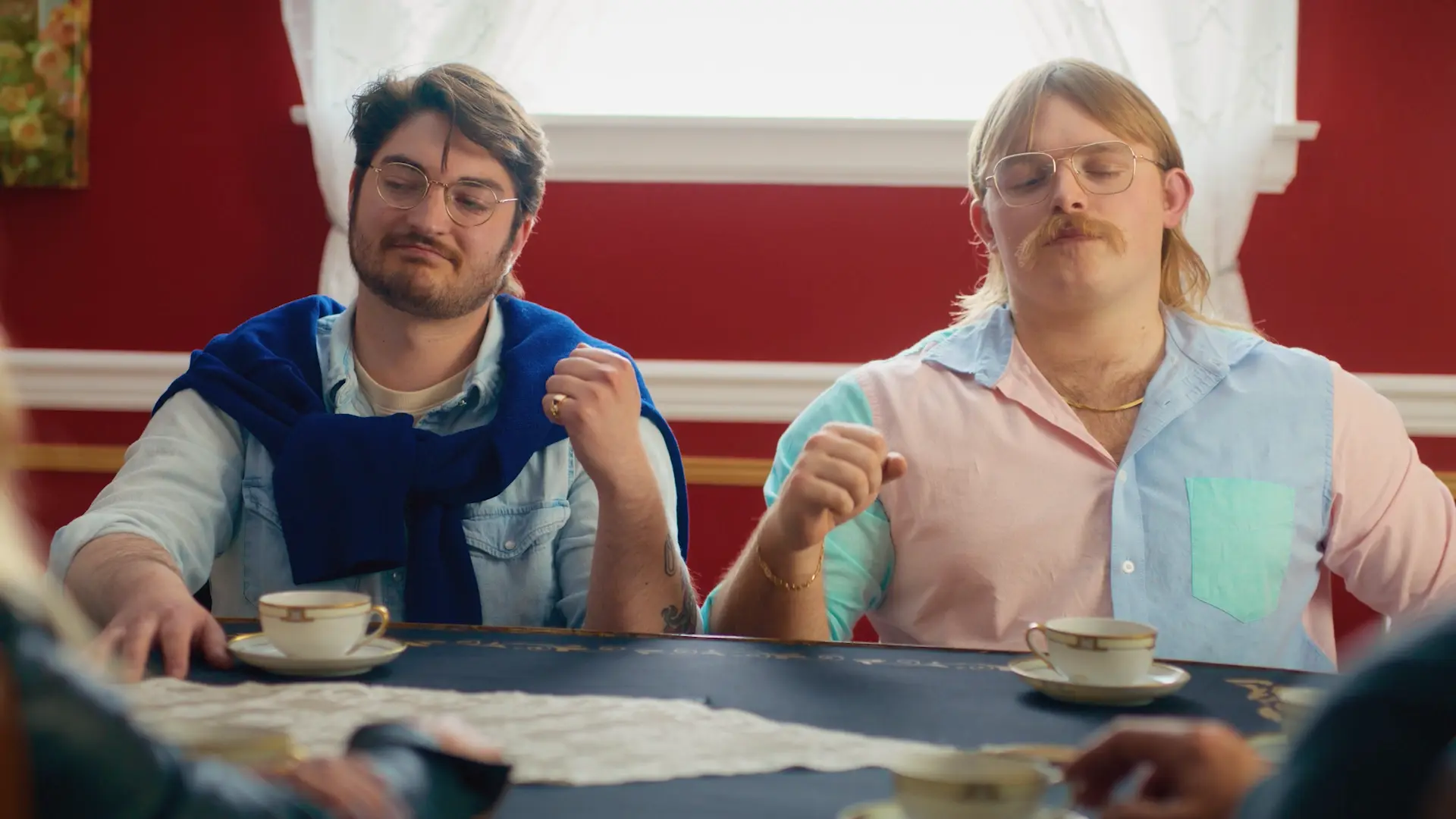 Two men at a tea party, comedy still from an NW Collective spot