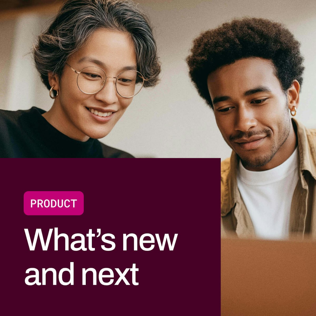 Two people sit together, smiling and focused on a laptop screen. Below them, a dark maroon banner reads “Product” in pink and “What's new and next” in bold white text, introducing product updates or innovations in a friendly, collaborative tone.