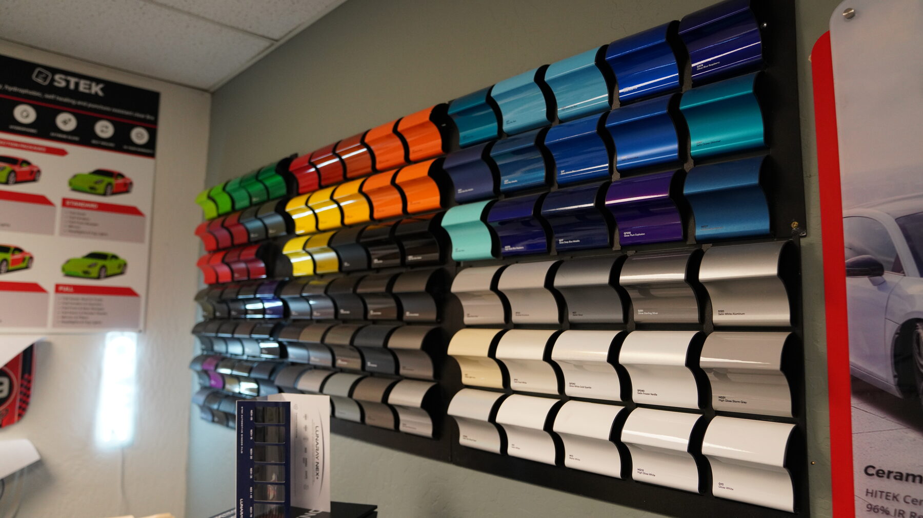 Window tint film shades and tiers on display at BGI Pro Auto Detailing