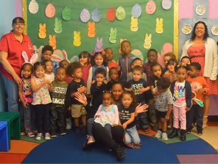 A picture of a class of preschool kids and teachers