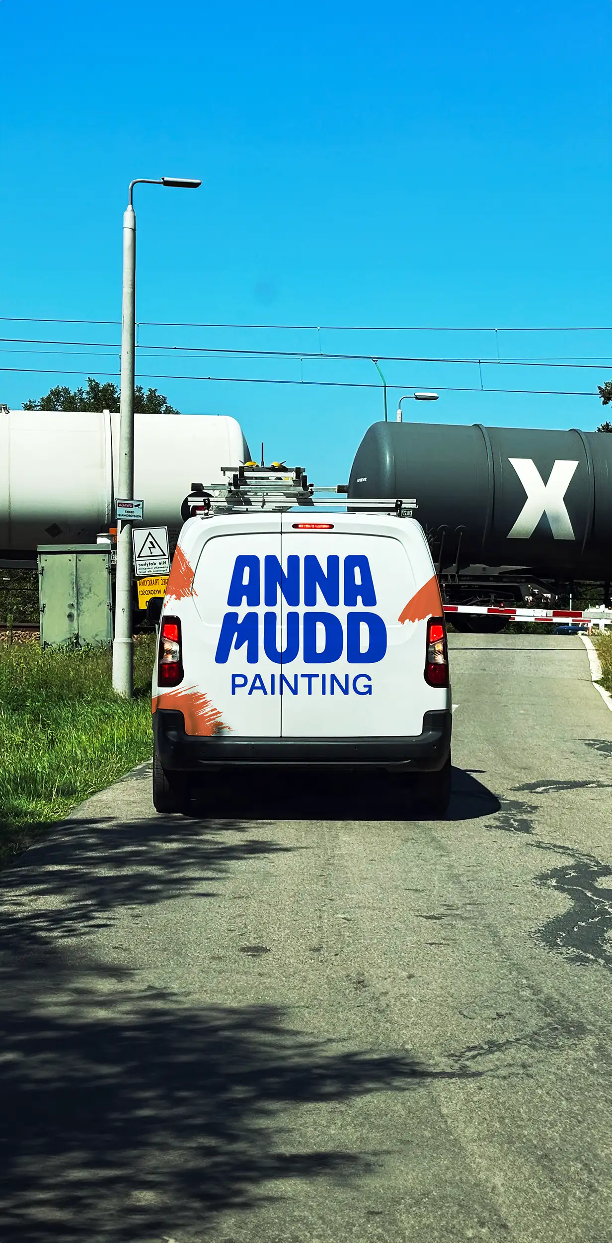 Van with Anna Mudd Painting vinyl wrap