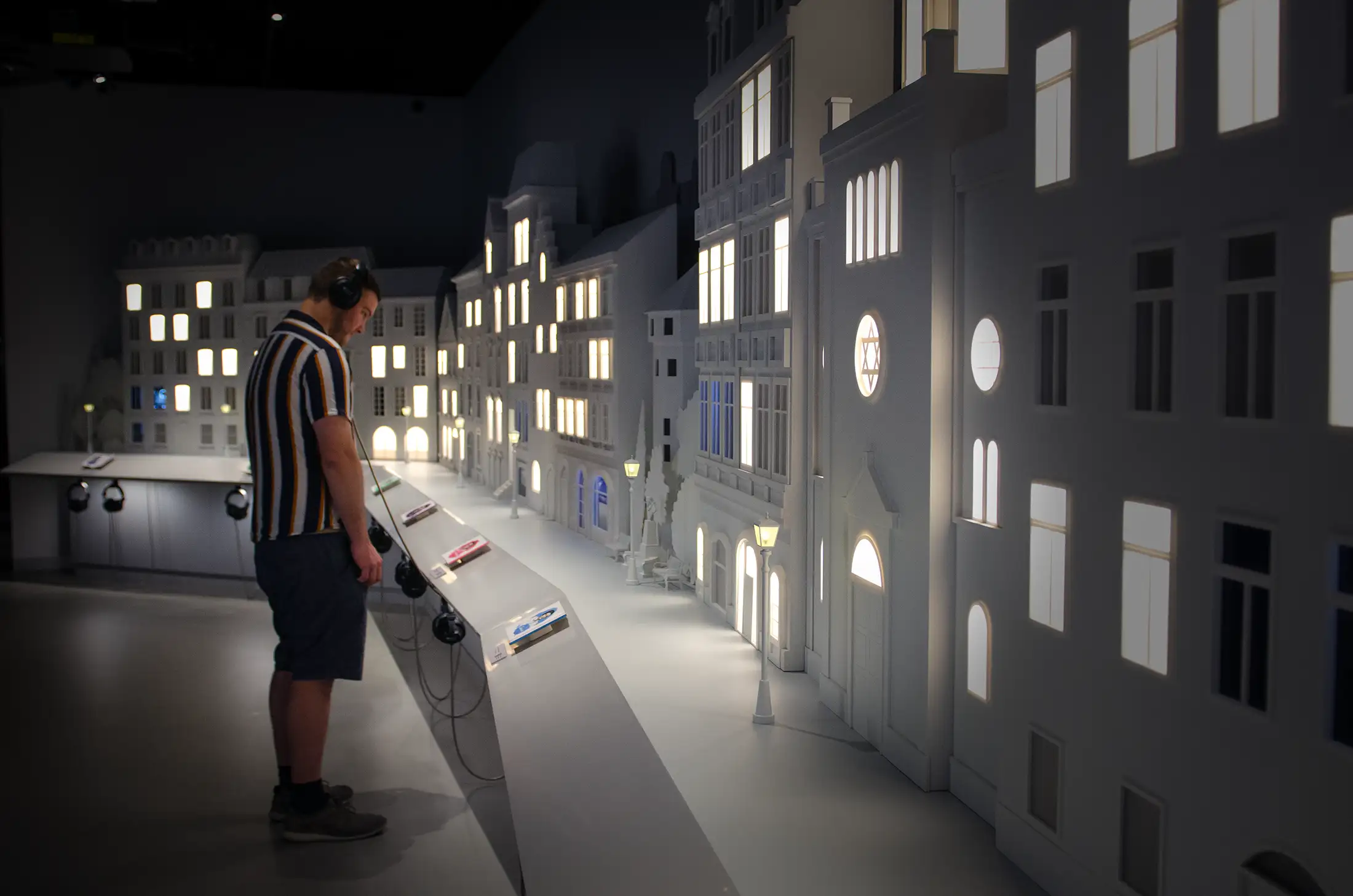 Visitor standing in front of the model village