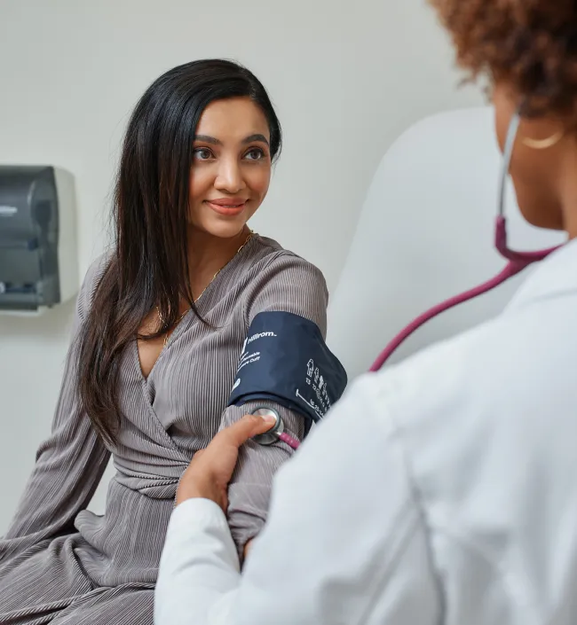 Dr. Hyatt examining a patient