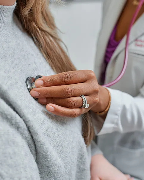 Dr. Hyatt examining a patient