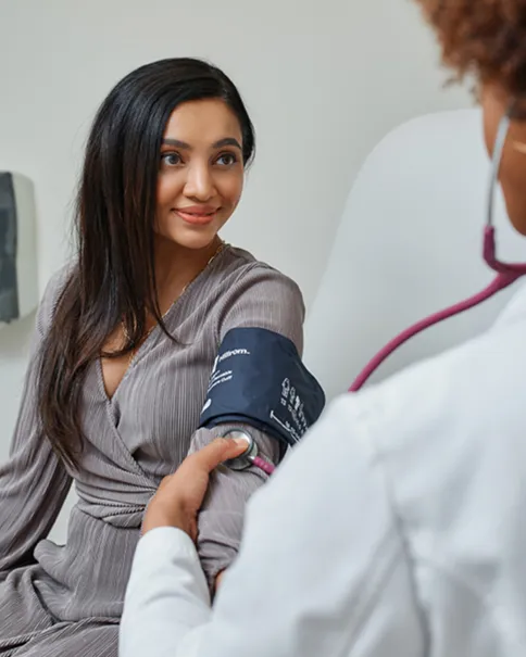 Dr. Hyatt examining a patient