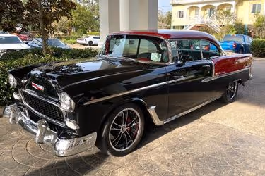 Beautiful car parked outside The Inn at Long Beach Hotel