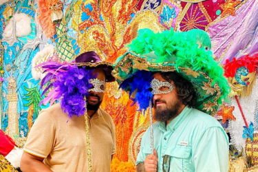 People celebrating Mardi Gras  with masks