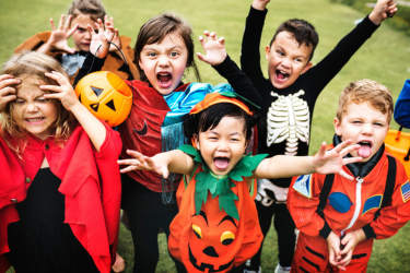 Group of kids with halloween costumes