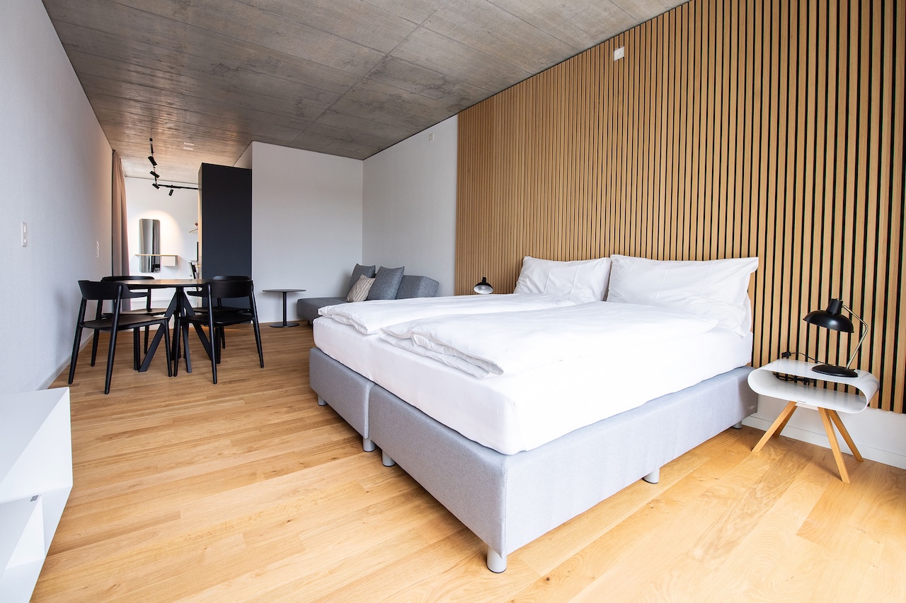 Die stilvoll eingerichteten Apartments überzeugen mit einem modernen Design und einer durchdachten, funktionalen Ausstattung.