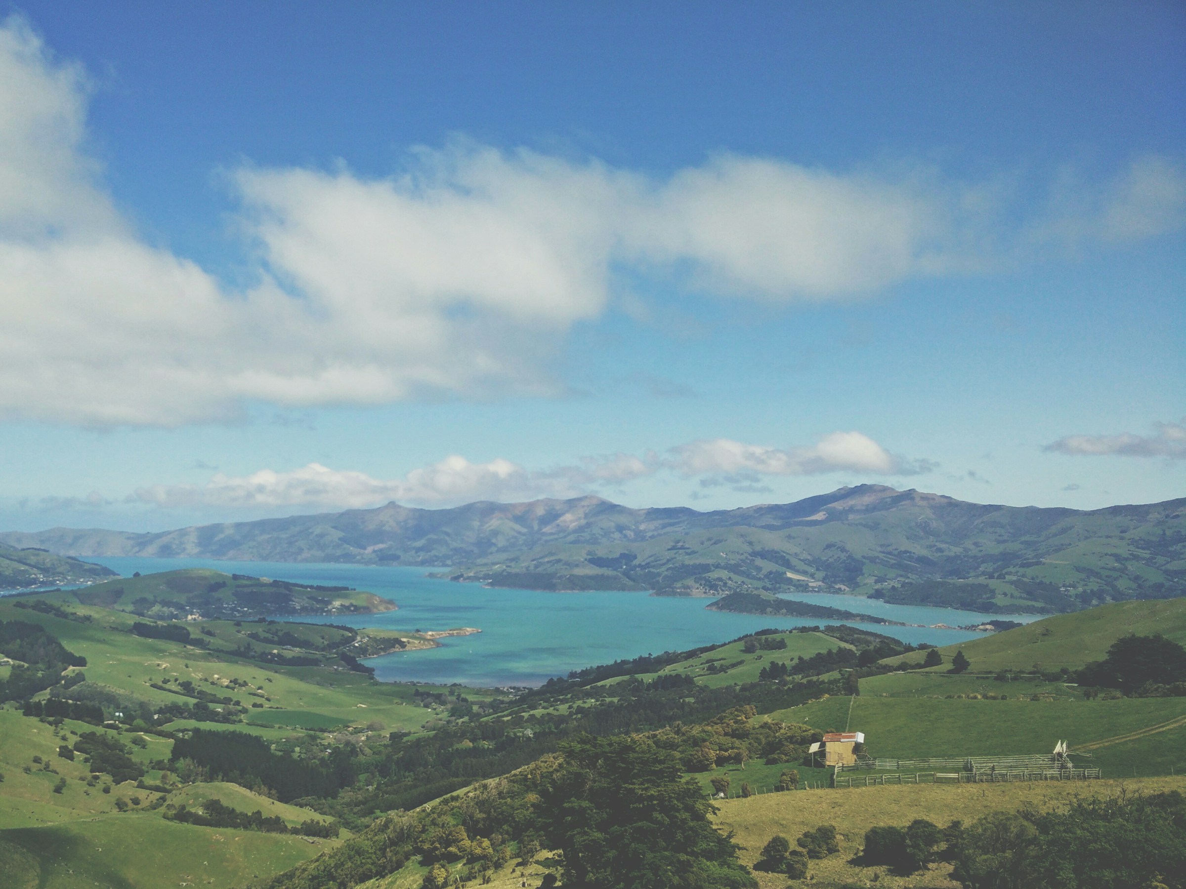 The view from Akaroa harbour where sustainable development frameworks have led to the development of comprehensive environmental management systems