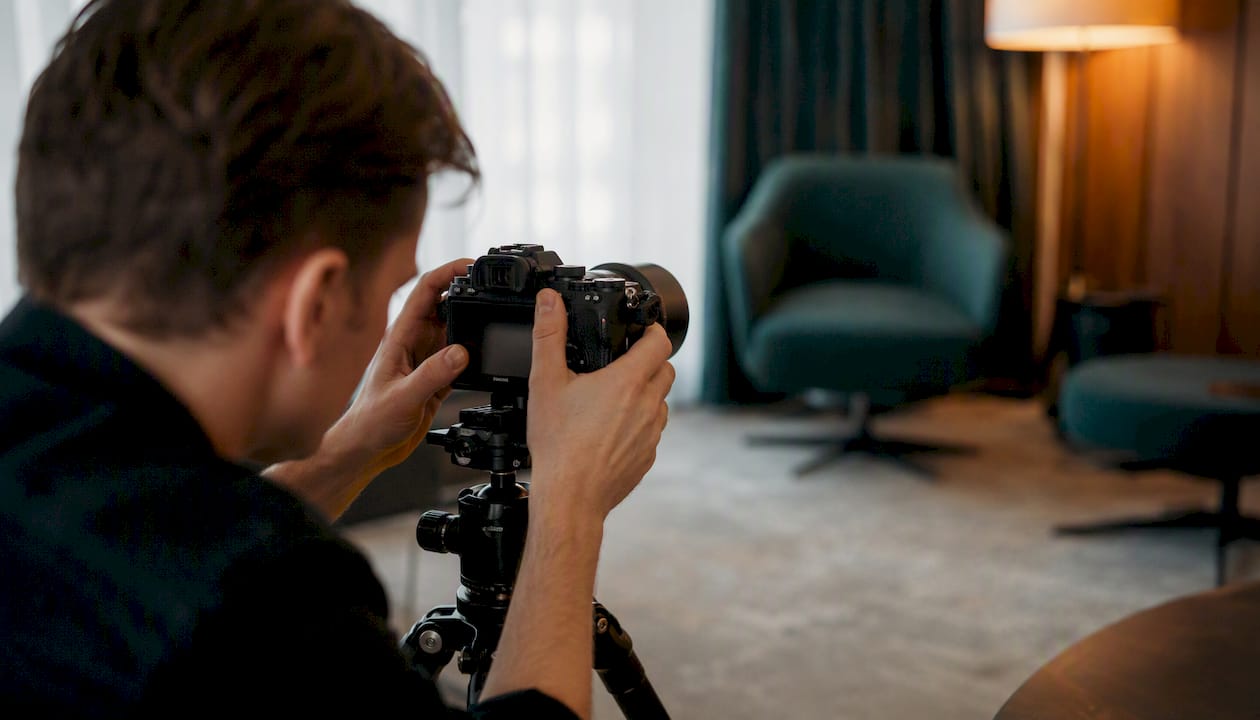 Photographer adjusting camera for headshot session
