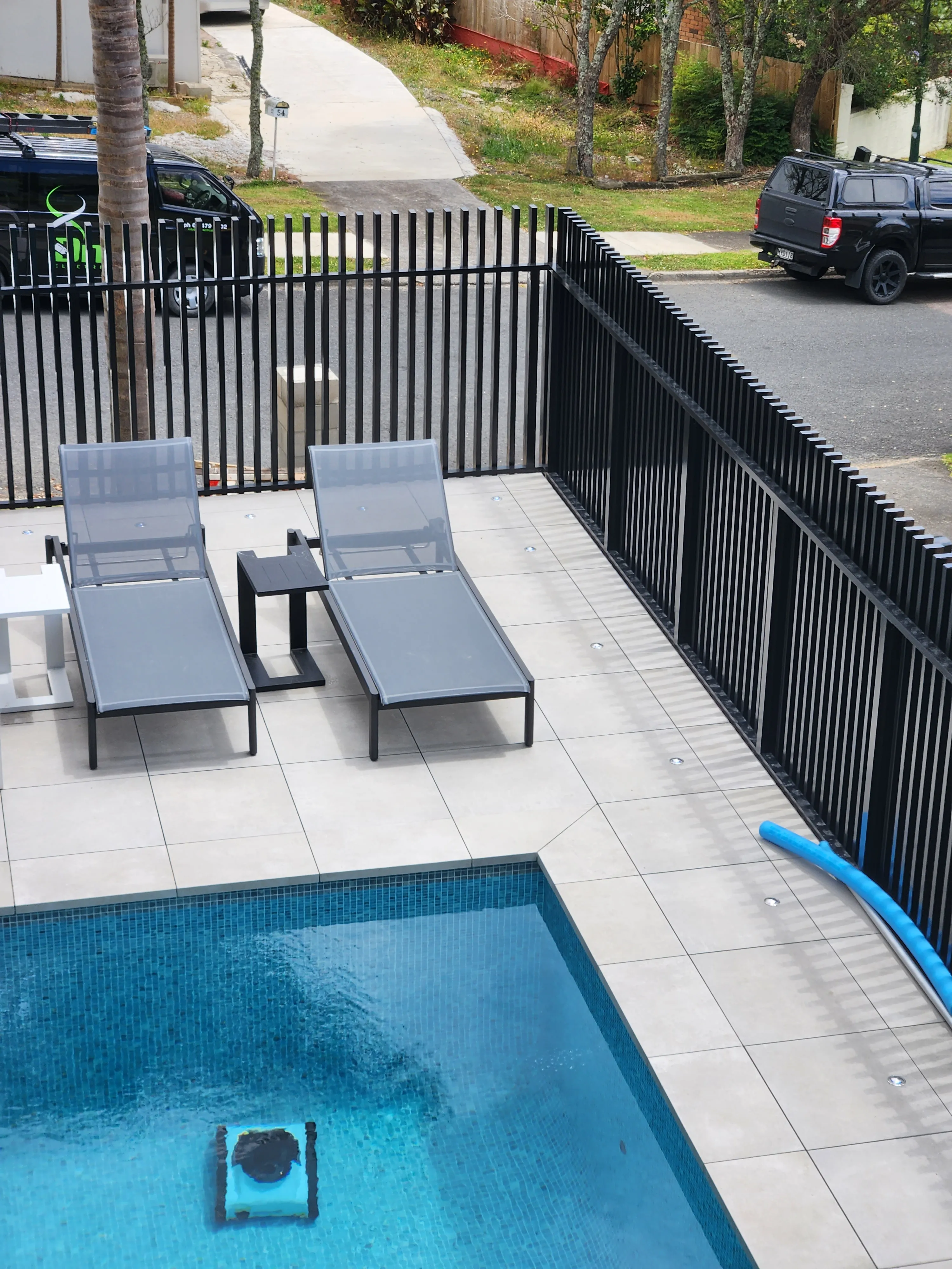 Aluminium Framed Decking system for tile decking arounud a swimming pool. long spanning joists for permeable decking.