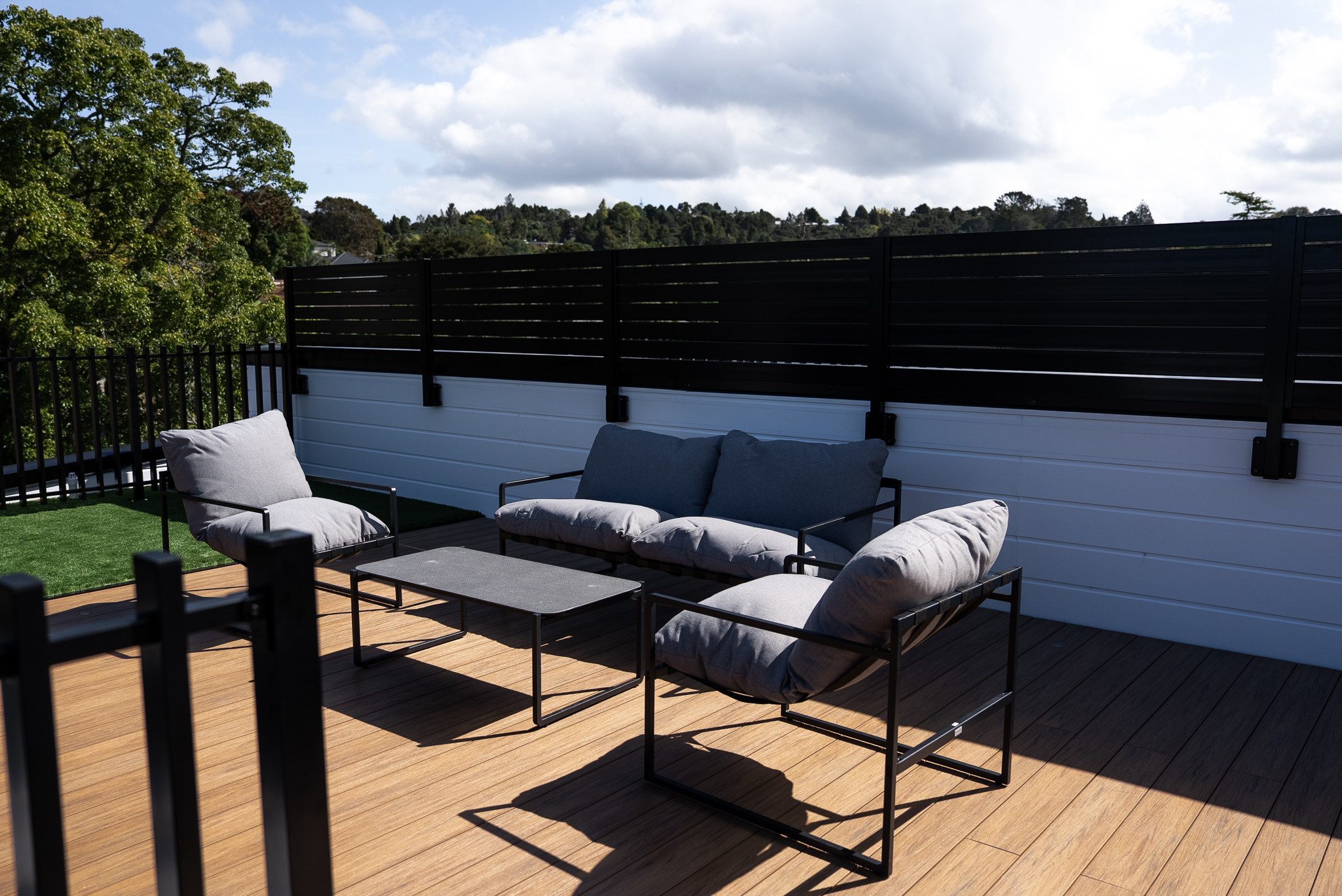 Timber Framed Pedestal Deck with Glass Vice finrail fencing attached