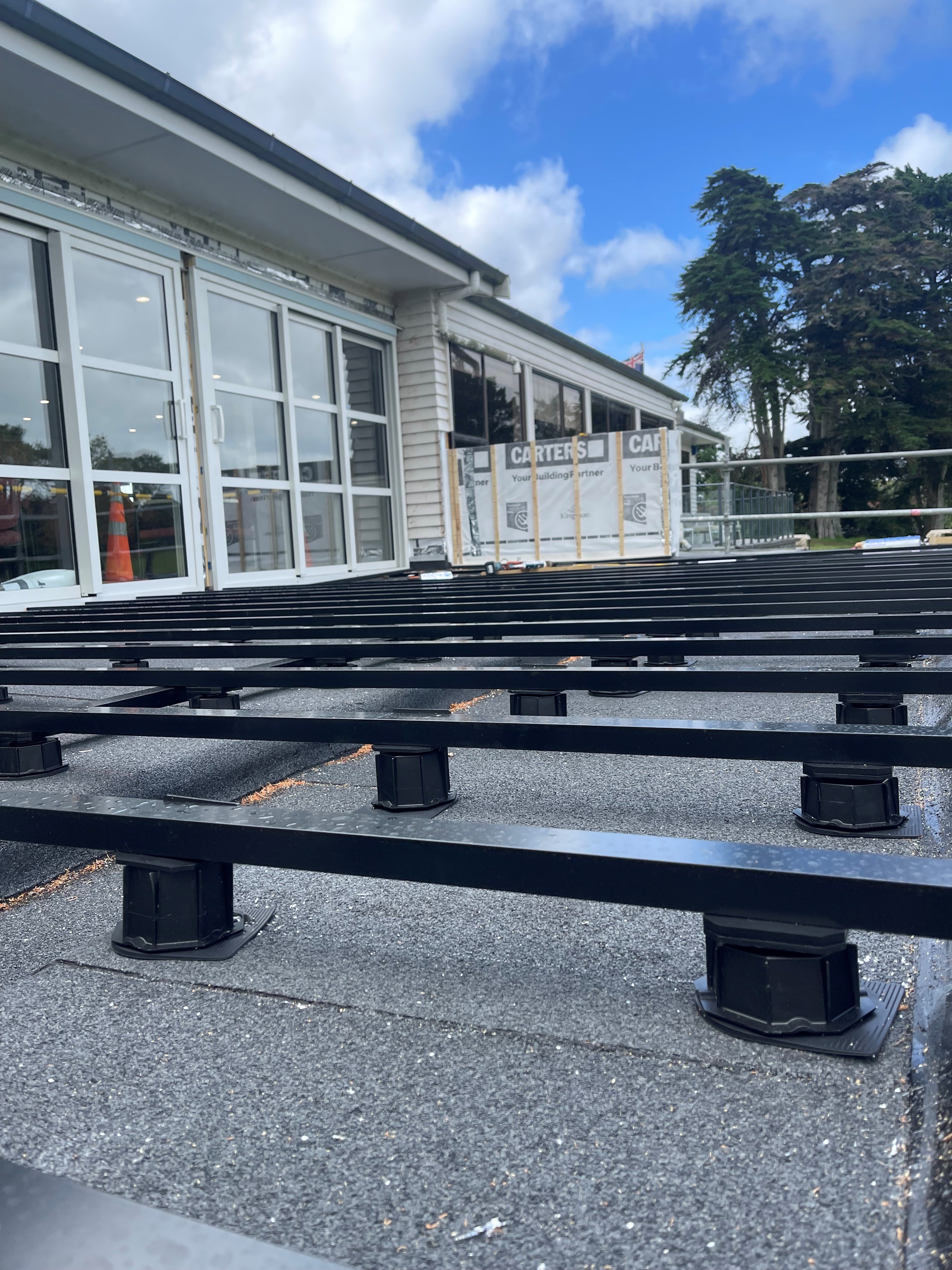 cost effective Pedestal Timber Deck Systems on AluFrame Aluminium Joists by Anchorjak installed by Pukekohe Builders and designed by Hurley Architects in Pukekohe