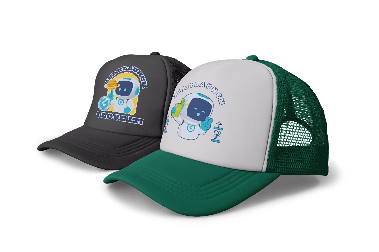 Two mesh trucker hats with playful astronaut-themed GearLaunch designs — one in black with “I Prove It!” slogan, the other in white and green with cartoon mission patch graphics — ideal for showcasing POD creativity and branded merch.