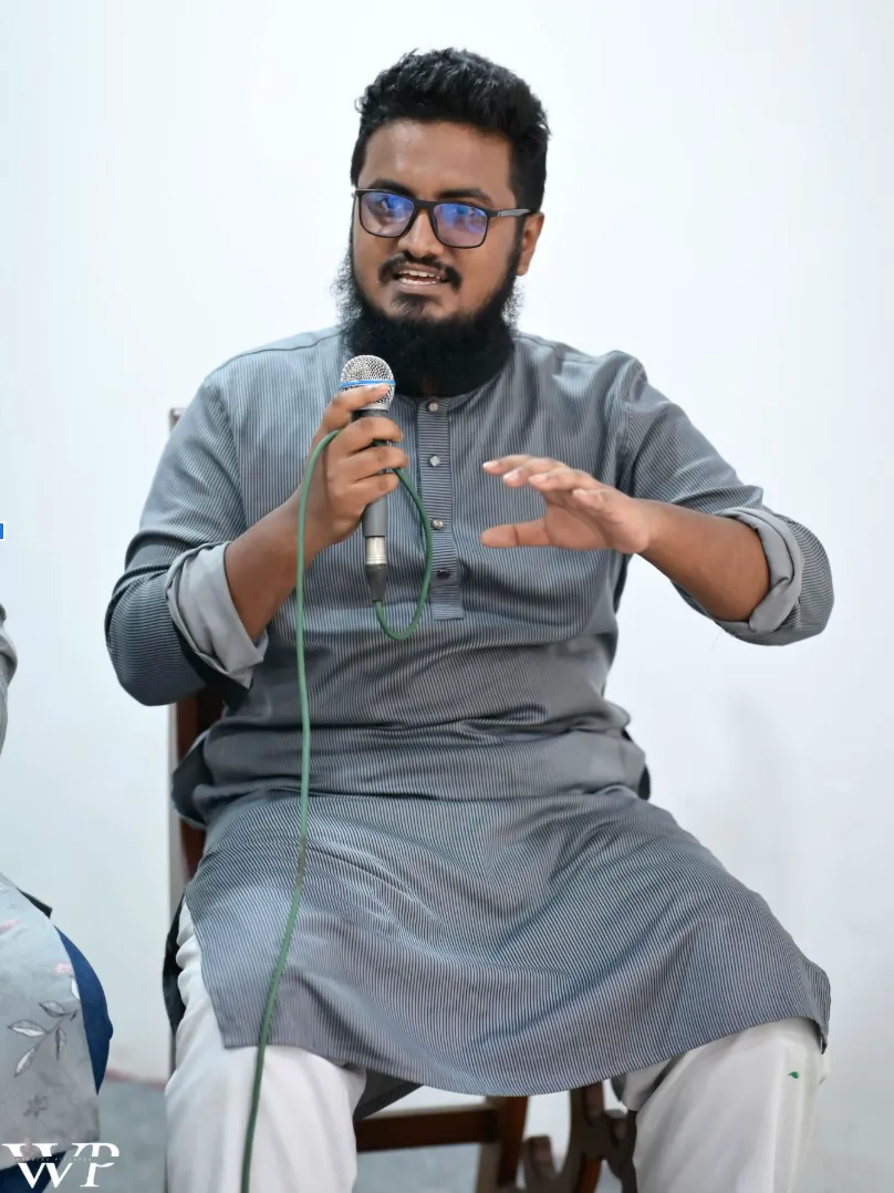 Speaker sharing insights on Print-on-Demand strategies during GearCon Comilla 2025 panel session.