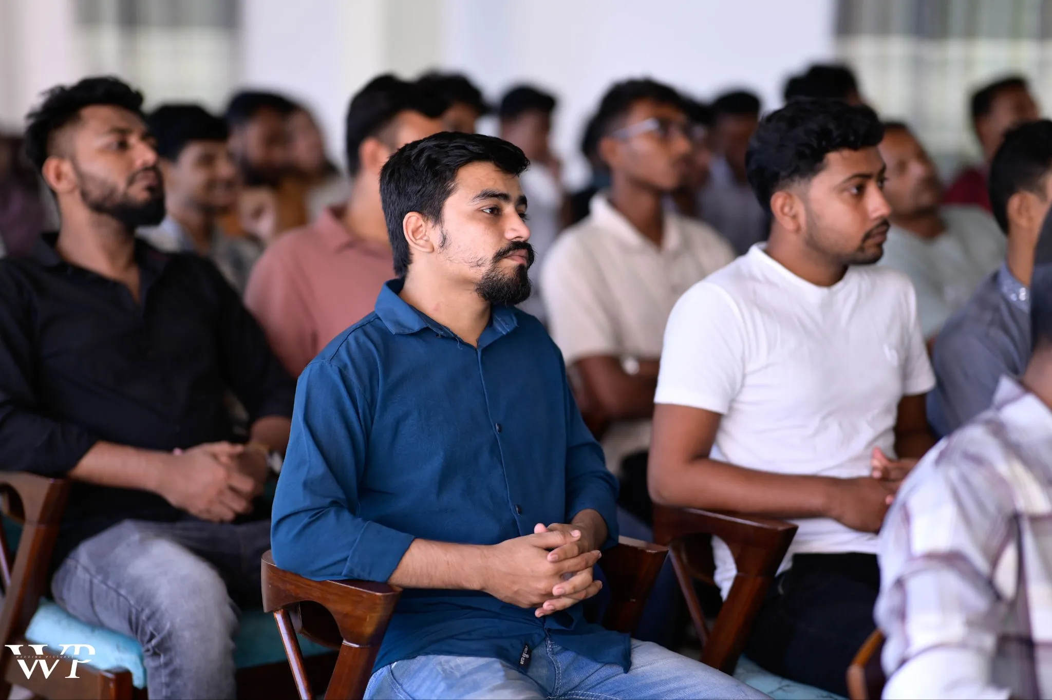 Participants at GearCon Comilla 2025 focused on learning POD business strategies.