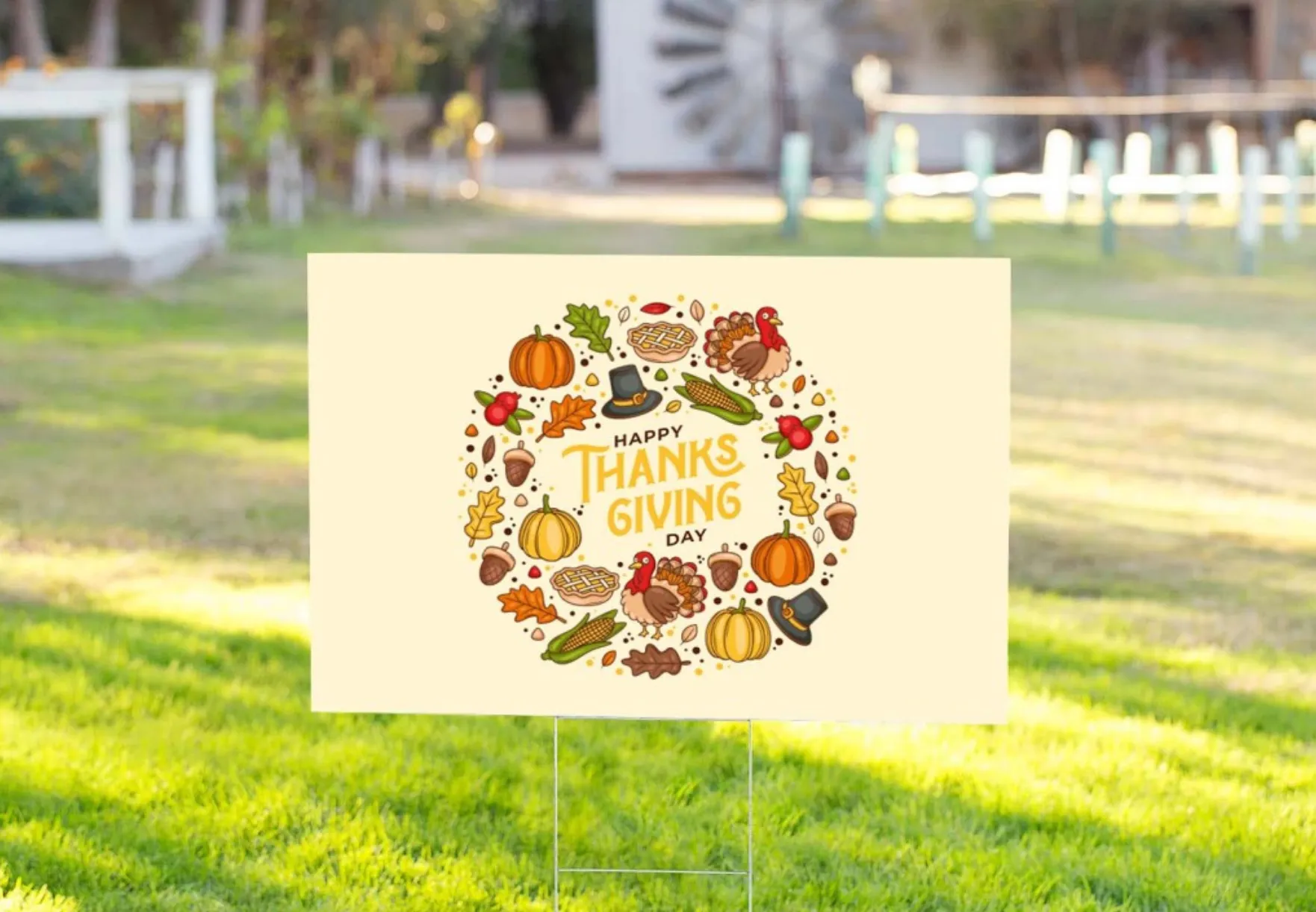 Colorful Thanksgiving yard sign with autumn decorations, celebrating Thanksgiving Day with pumpkins and turkeys.