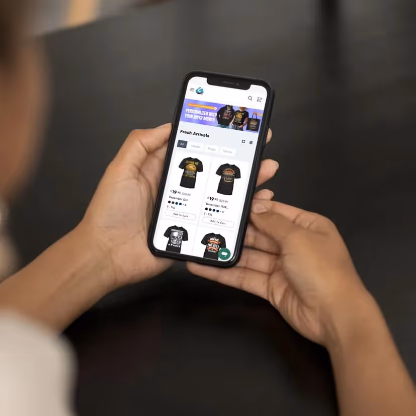Online store on mobile showing holiday T-shirt sales during Black Friday and Cyber Monday