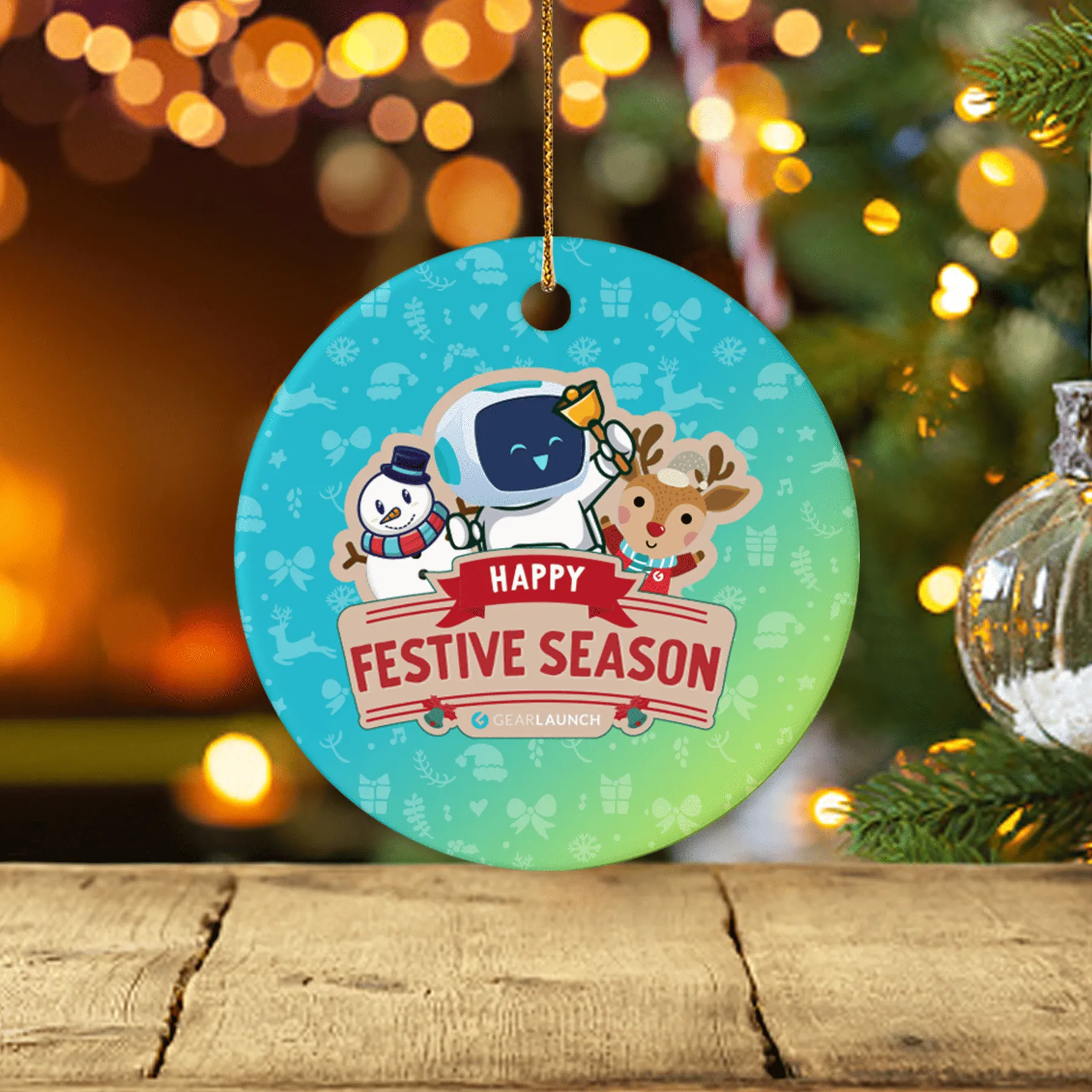 Festive Christmas ornament featuring GearLaunch mascot with snowman and reindeer, hanging on a decorated holiday tree with warm lights.