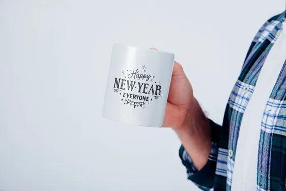 Mockup of personalized New Year products like mugs