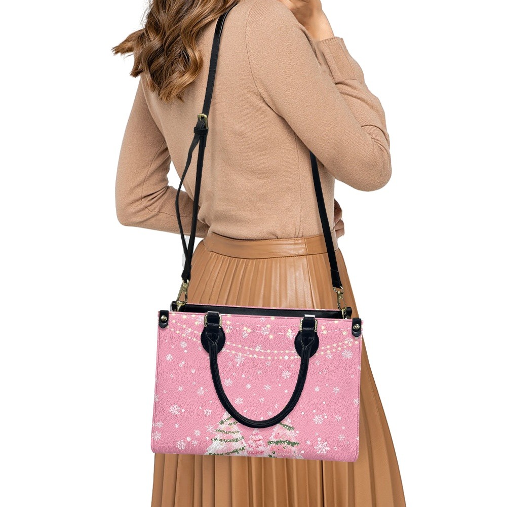 Custom printed lightweight ladies PU leather handbag shown on a marble block in a studio setting.