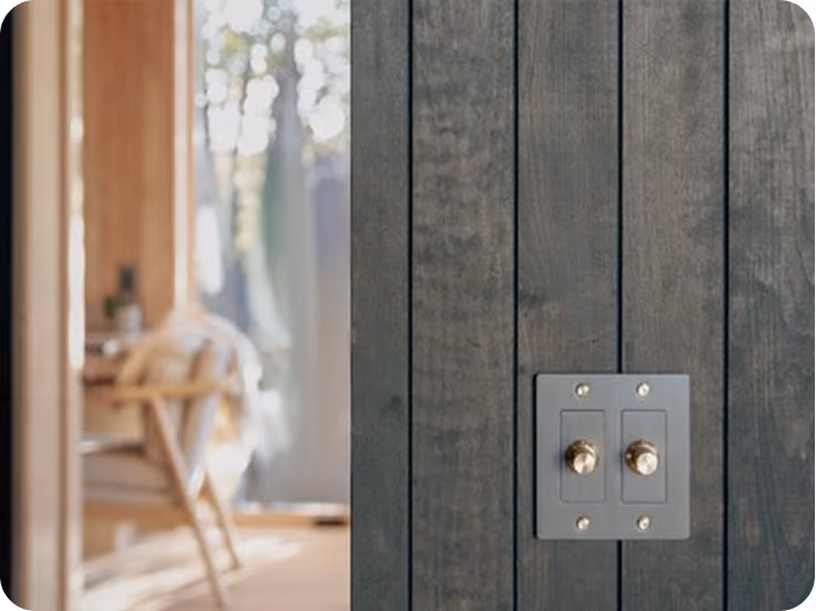Machined brass switches on ELMNTL modular prefab hospitality cabins