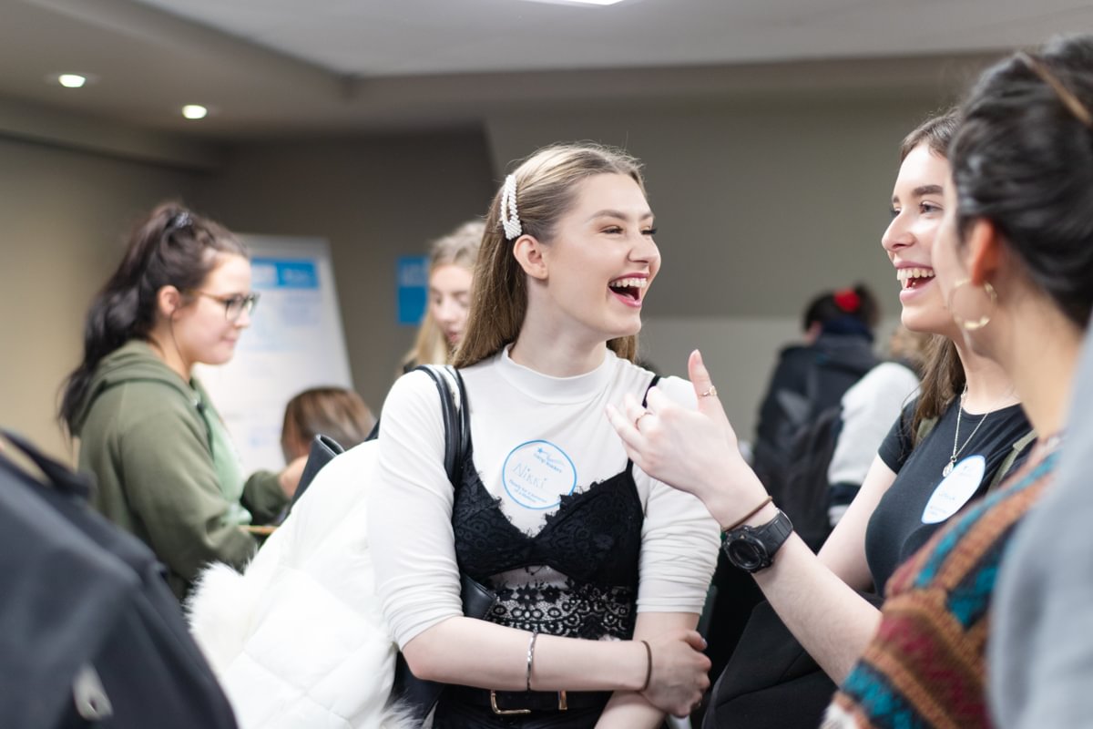 Participants laughing at a hiring fair