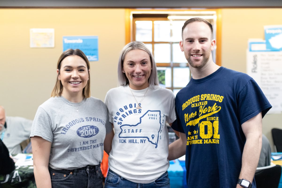 A group of staff members from different camps